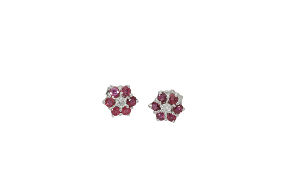 Σκουλαρίκια σε λευκόχρυσο 18Κ ροζέτα αστράκι με ένα διαμάντι και ρουμπίνια.
