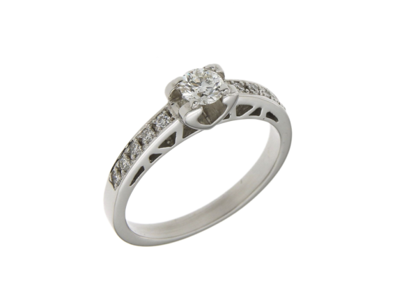 Δαχτυλίδι σε Λευκόχρυσο 18K Μονόπετρο σε καστόνι σε σχήμα καρδιάς και με Διαμάντια στα πλάγια