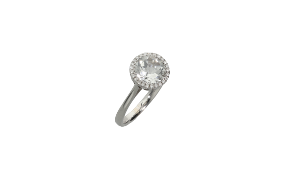 Δαχτυλίδι σε λευκόχρυσο 18Κ ροζέτα στρογγυλή με διαμάντια και λευκό τοπάζ.