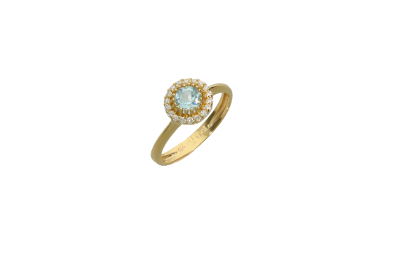 Δαχτυλίδι σε χρυσό 18Κ  στρογγυλή ροζέτα με διαμάντια και ένα μπλε τοπάζ.