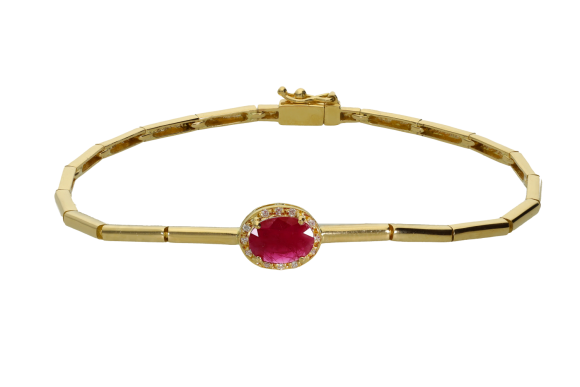Βραχιόλι σε χρυσό 18Κ ίσια στελέχη με οβάλ ροζέτα στο κέντρο με διαμάντια και ένα ρουμπίνι.