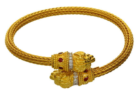 Βραχιόλι σε χρυσό 18Κ χειροποίητο κάλτσα αντικριστή με λιοντάρια στις άκρες με διαμάντια και ρουμπίνια.
